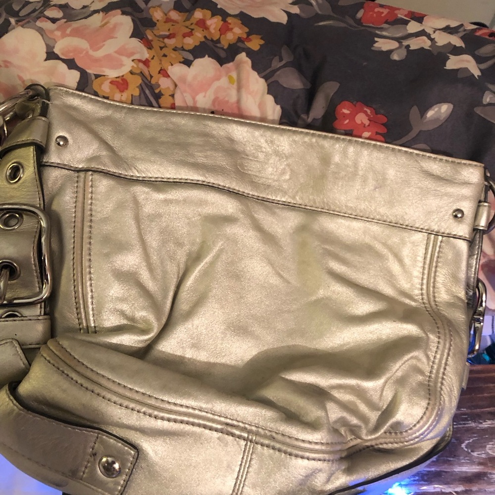 Metallic, silver hobo coach bag